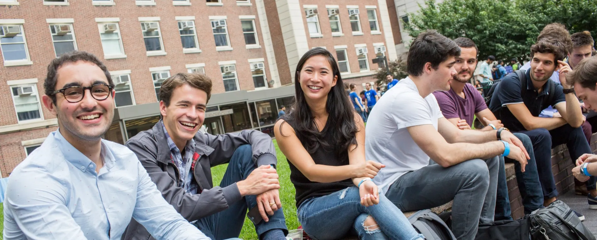 SEAS Engineering Students Sitting on Bench Outside of Building